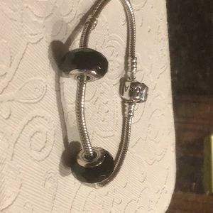 2 Pandora black faceted Murano charms. Bracelet is not included